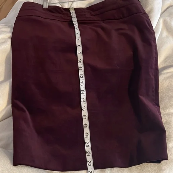 GUCCI dark purple velvet skirt w/side zip, kickpleat. Embroidered belt detail
